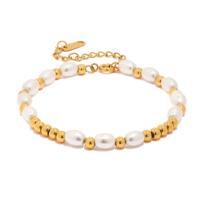 Armband gouden kralen met parels