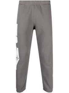 Heron Preston pantalon de jogging à logo imprimé - Gris