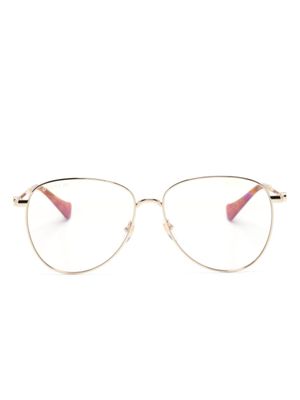 Gucci Eyewear lunettes de vue Double G à monture papillon - Or