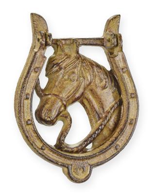 A CAST IRON HORSESHOE DOOR KNOCKER