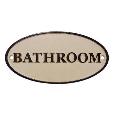 A CAST IRON "BATHROOM" PLAQUE