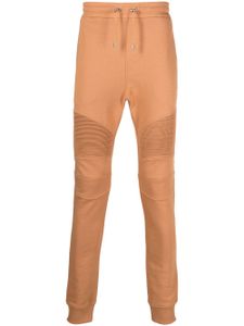 Balmain pantalon de jogging à logo imprimé - Marron