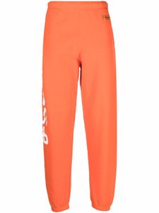 Heron Preston pantalon de jogging à imprimé СТИЛЬ - Orange