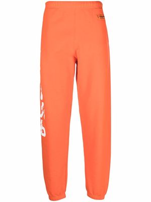 Heron Preston pantalon de jogging à imprimé СТИЛЬ - Orange