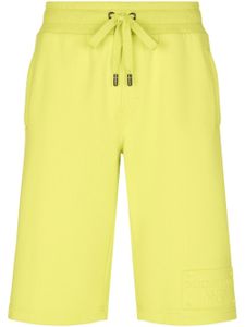 Dolce & Gabbana short de sport à logo brodé - Jaune