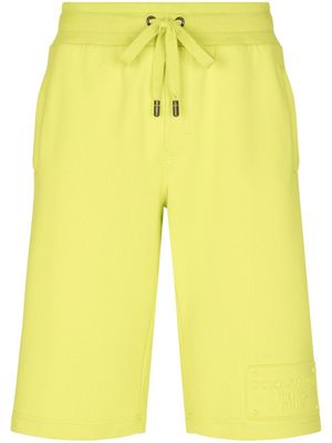 Dolce & Gabbana short de sport à logo brodé - Jaune