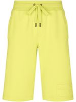 Dolce & Gabbana short de sport à logo brodé - Jaune