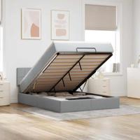 Ottoman bed met matras en LED's 140x200cm stof lichtgrijs