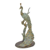A BRONZE PEACOCK FOUNTAIN