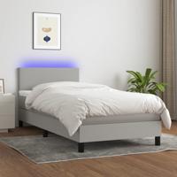 Boxspring met matras en LED stof lichtgrijs 90x190 cm