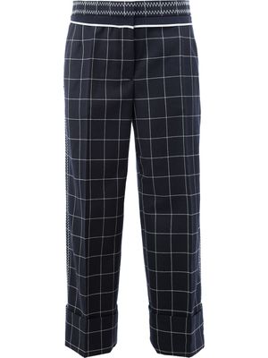 Thom Browne pantalon à carreaux - Bleu