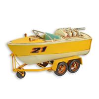 A TIN MODEL OF A SPEEDBOAT ON TRAILER A TIN MODEL OF A SPEEDBOAT ON TRAILER