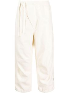 Maharishi pantalon de jogging crop à design asymétrique - Tons neutres