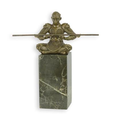 A BRONZE SCULPTURE OF A CHINESE WARRIOR MONKEY