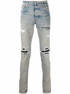 AMIRI jean skinny à fini usé - Bleu