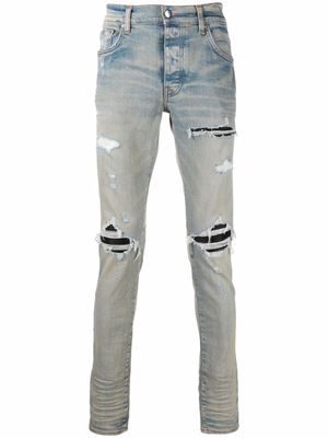 AMIRI jean MX1 skinny à effet usé - Bleu