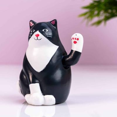 Zwaaiende kat op zonne-energie Zwaaiende kat op zonne-energie