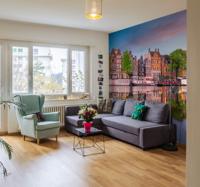 Fotobehang Amsterdams kanaal en grachtenpand
