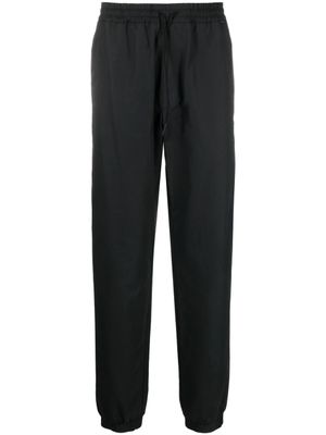 Moncler pantalon de jogging à patch logo - Noir