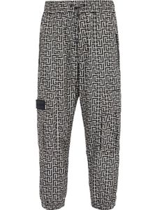Balmain pantalon de jogging à imprimé monogrammé - Noir