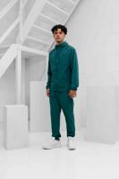 Under Armour Vibe Woven Trainingspak Heren Groen - Maat S - Kleur: Groen | Soccerfanshop