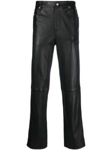 Diesel pantalon en cuir à logo embossé - Noir