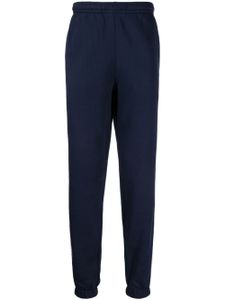 Lacoste pantalon de jogging à rayures latérales - Bleu