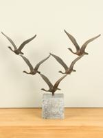 5 bronzen zwanen