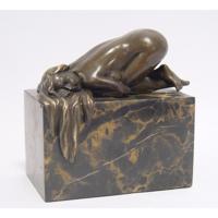 A BRONZE SCULPTURE OF A FEMALE NUDE - thumbnail