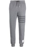 Thom Browne pantalon de jogging à rayures latérales - Gris