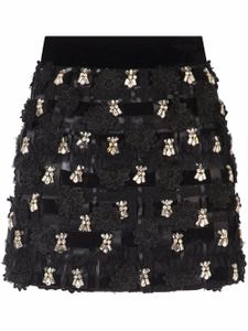 Dolce & Gabbana minijupe tissée à fleurs appliquées - Noir