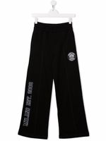 MSGM Kids pantalon de jogging ample à logo imprimé - Noir