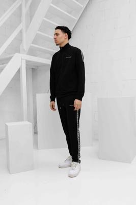 XPLCT X SFS Creative Trainingspak Heren Zwart/Wit - Maat XS - Kleur: WitZwart | Soccerfanshop