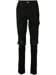 AMIRI jean skinny à effet usé - Noir