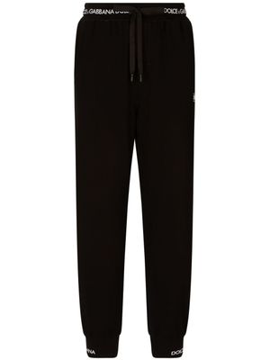 Dolce & Gabbana pantalon de jogging à taille logo - Noir