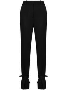 JW Anderson pantalon slim à cheville nouée - Noir