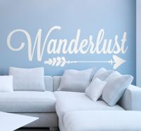 Tekst muursticker Wanderlust pijl