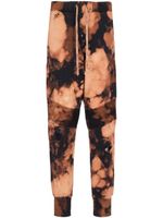 Balmain pantalon de jogging à imprimé tie-dye - Marron
