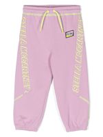 Stella McCartney Kids pantalon de jogging en coton à logo imprimé - Rose