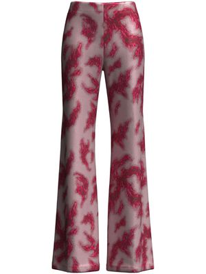 Maccapani pantalon évasé à imprimé graphique - Rouge