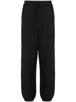 Y-3 pantalon de jogging en coton à patch logo - Noir