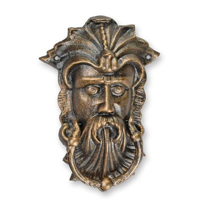A CAST IRON VIKING FACE DOOR KNOCKER