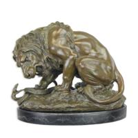 A BRONZE SCULPTURE OF A LION AND SERPENT A BRONZE SCULPTURE OF A LION AND SERPENT