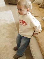Babyset met sweater en wijde jeans vanille
