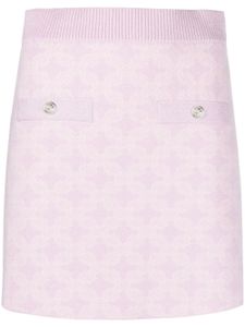 Maje minijupe à motif monogrammé en jacquard - Rose