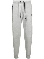 Nike pantalon de jogging à logo imprimé - Gris Nike pantalon de jogging à logo imprimé - Gris