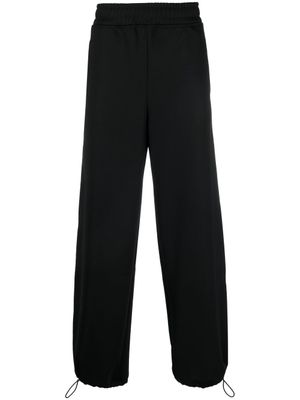 JW Anderson pantalon de jogging Run Hany à logo - Noir