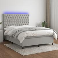 Boxspring met matras en LED stof lichtgrijs 140x190 cm