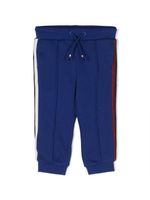 Tommy Hilfiger Junior pantalon de jogging en coton mélangé à rayures - Bleu