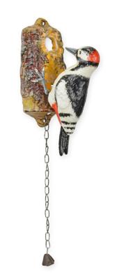 A CAST IRON WOODPECKER DOOR KNOCKER